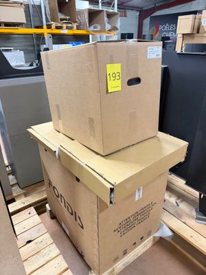 two boxes stacked on top of each other on a pallet