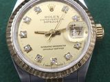 an image of a rolex watch with diamonds on the dial