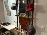an image of a hat rack with hats on it