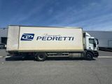 a delivery truck that is parked in the parking lot