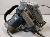 a small electric tool that is sitting on a table