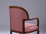an image of a chair with a pink upholstered seat