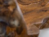 a close up of a wooden bench made out of wood