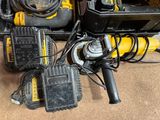 yellow and black tools are sitting on the floor next to each other