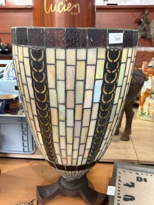 a vase that is sitting on a table in a store