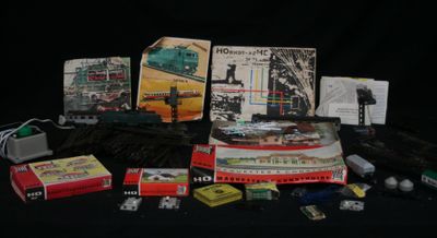many different types of toy trains on a table