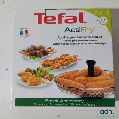 une boîte de snacks Tefal Actify posée sur une table