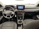 the interior of a car with a steering wheel, dashboard, and dash board