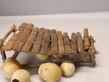 a small musical instrument made out of bamboo sticks