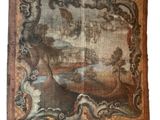 an antique tapestry with a painting of a woman and a man in a landscape