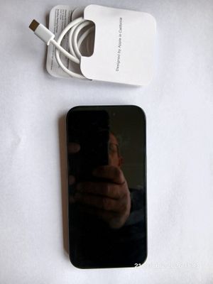 someone is taking a picture of their cell phone with a camera attached to it
