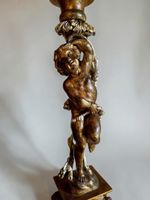 Colonne porte-torchère à quatre bras de lumière retenus par … (photo 3)