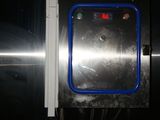 an image of a stainless steel door with a blue handle