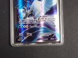 a pokemon card with a picture of a bird on it