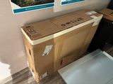 a cardboard box sitting on top of a table in a room