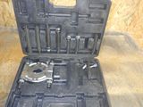 a tool case with tools inside of it on a table