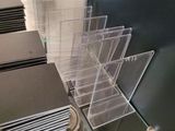 a lot of clear acrylic items on the table