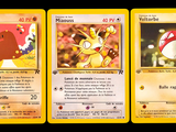 three pokemon cards are shown in a row on a black background