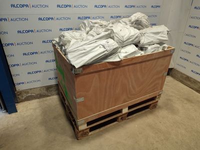 a wooden box with a bunch of bags on top of it