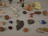 a lot of small figurines that are on the table