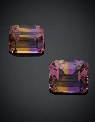 deux saphirs violets et jaunes sur fond noir