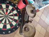 a picture of a dart board and some other items on the floor