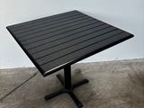 an image of a black square table with a black base