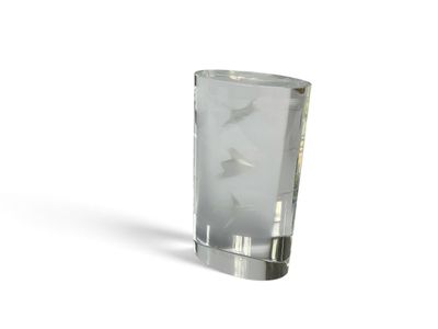a clear glass vase with a star design on it