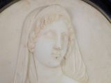 a picture of a picture of a woman with a veil