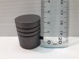 a measuring tape next to a bottle of water and a measuring tape