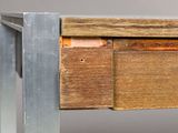 a close up of a piece of wood on a table