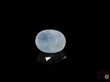 une image représentant une lune bleue dans le ciel nocturne, sur fond noir