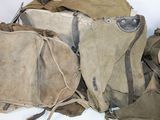 a lot of bags that are sitting on top of each other