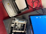 two laptops that are sitting on a table
