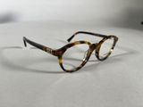 the glasses are made of tortoises and have clear lenses