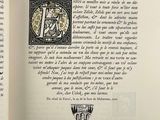 an open book with a picture of a man on it