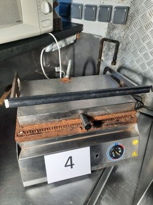 a machine that is sitting on a table with a number 4 on it