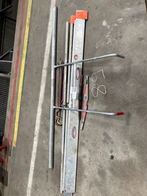 a lot of tools that are laying out on the floor