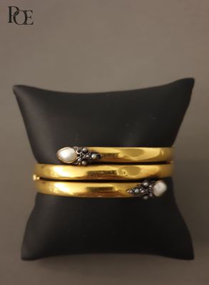 Bracelet jonc ouvrant en jaune 18k (750‰) à à deux rangs ter… - Photo 1