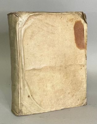an old book that is sitting on a table