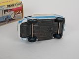 a toy truck that is sitting next to a box