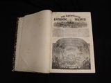 an old book with a picture of a tree inside of it