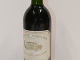a bottle of wine that is sitting on a table