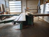 a picture of a table saw in a workshop