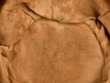 a close up of a brown bag with writing on it