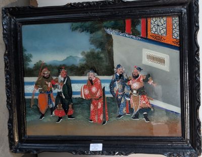 une photo d'un tableau accroché au mur d'un immeuble