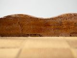 a wooden shoe that is sitting on a table