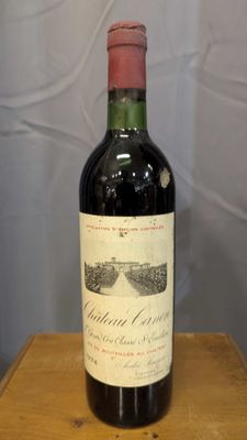 a bottle of wine that is sitting on a table