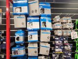 many boxes of electronics on the shelves in the store