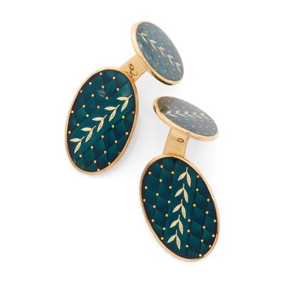 PAIRE DE BOUTONS DE MANCHETTE de forme ovale avec un dessin …